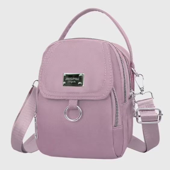 Mini najlonska torbica dimenzija 20x15 cm sada i u roze varijanti.